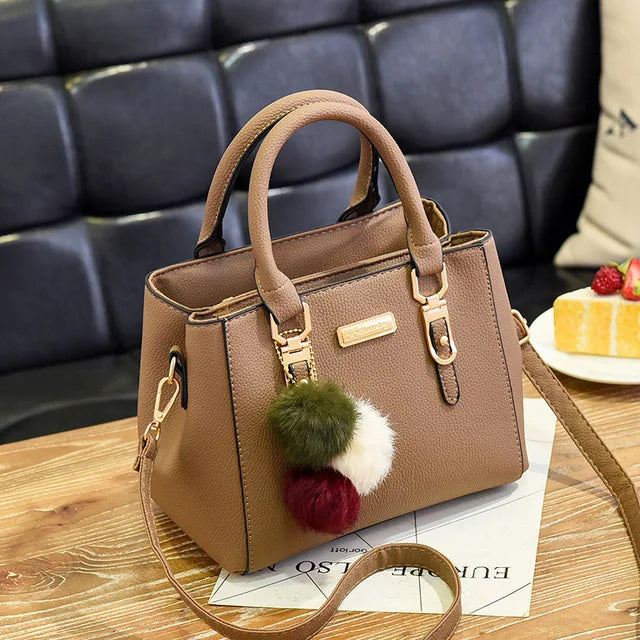 Women Shoulder Bag with Beading Pendant and Embossed Design