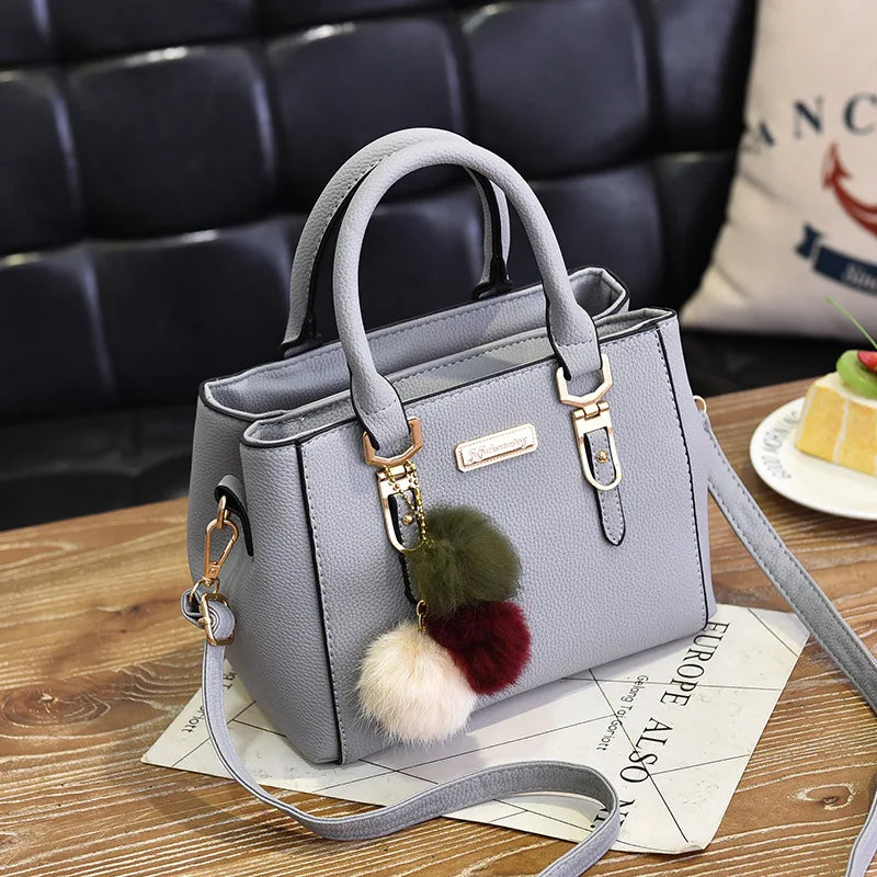 Women Shoulder Bag with Beading Pendant and Embossed Design