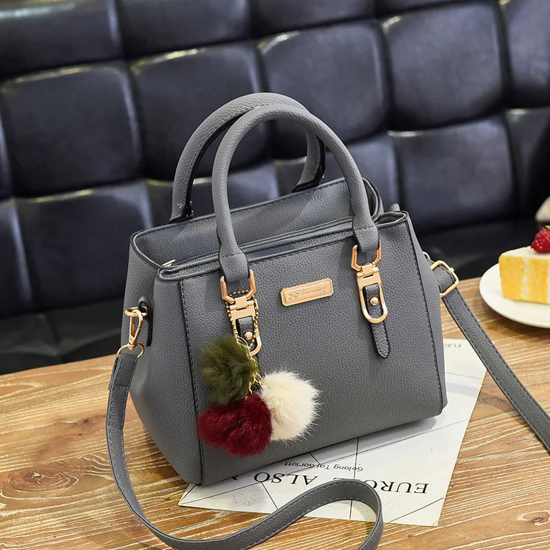 Women Shoulder Bag with Beading Pendant and Embossed Design